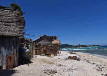 Coastal wooden buildings, Atlántida Seascape, Honduras