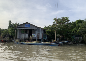 River_Myanmar_Boat on a river in palm trees_OPG2_ 6581